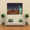 Manhattan Skyline and the Statue of Liberty at Night, New York City Multi panel canvas Wall art