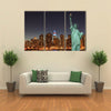 Manhattan Skyline and the Statue of Liberty at Night, New York City Multi panel canvas Wall art