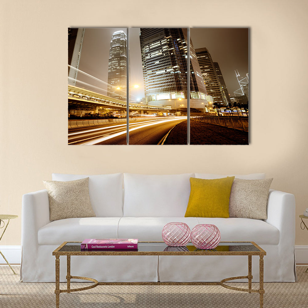 Fast moving cars at night Multi Panel Canvas Wall Art