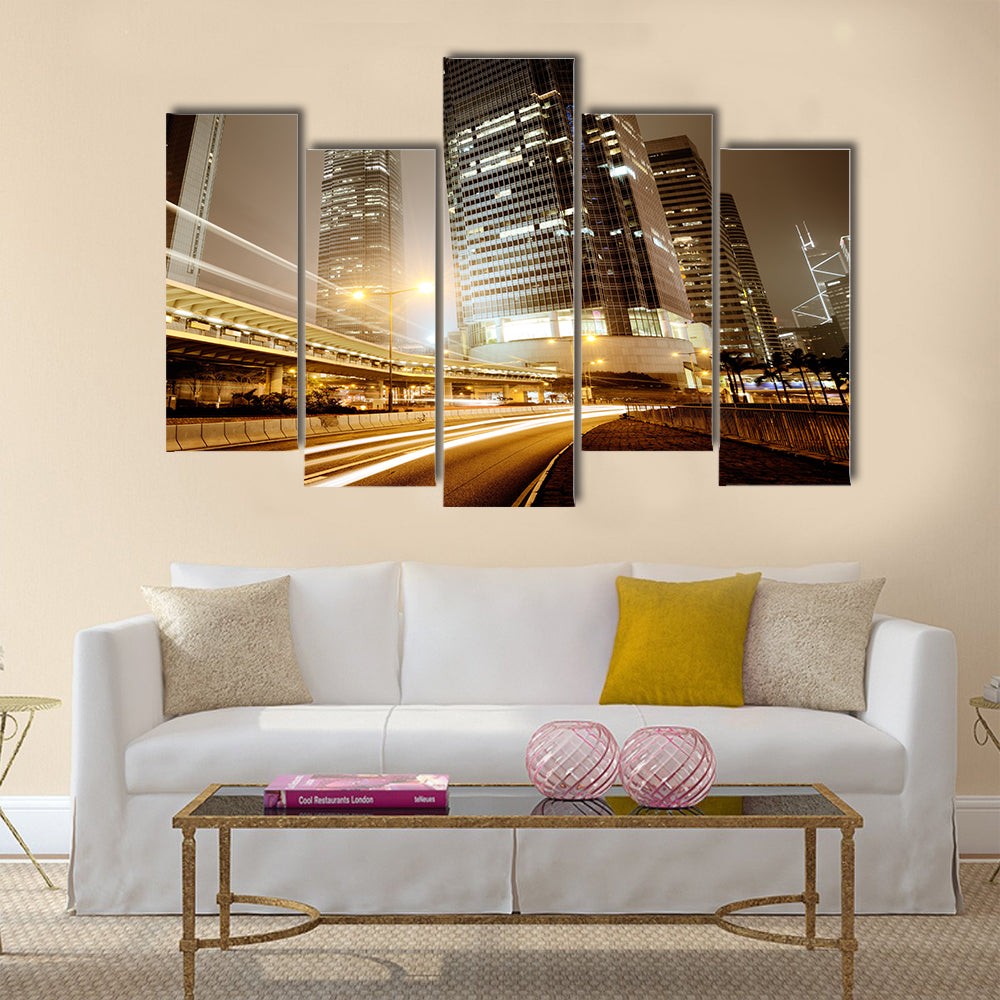 Fast moving cars at night Multi Panel Canvas Wall Art