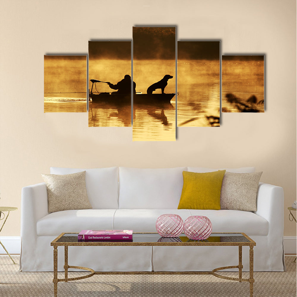 Silhouette of fisher and dog sitting in boat multi panel canvas wall art