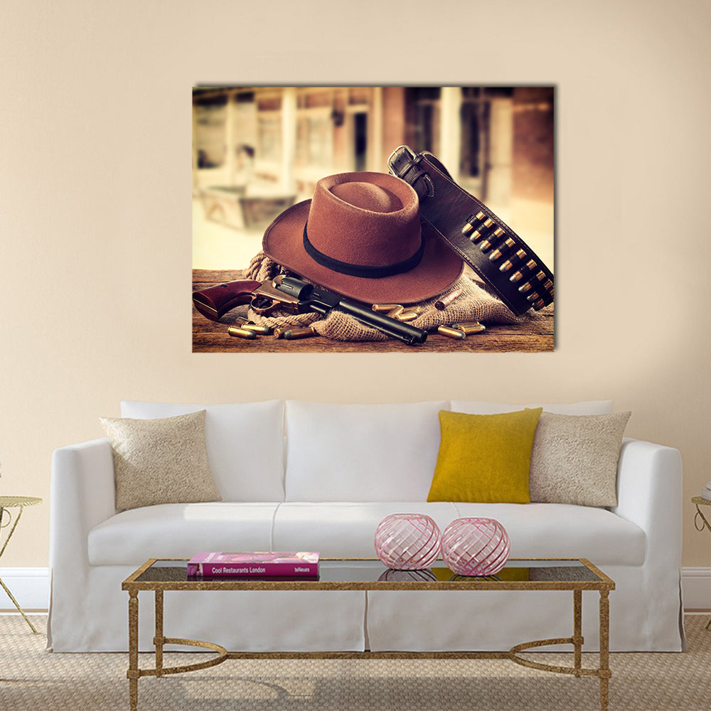 Western accessories on wooden table multi panel canvas wall art