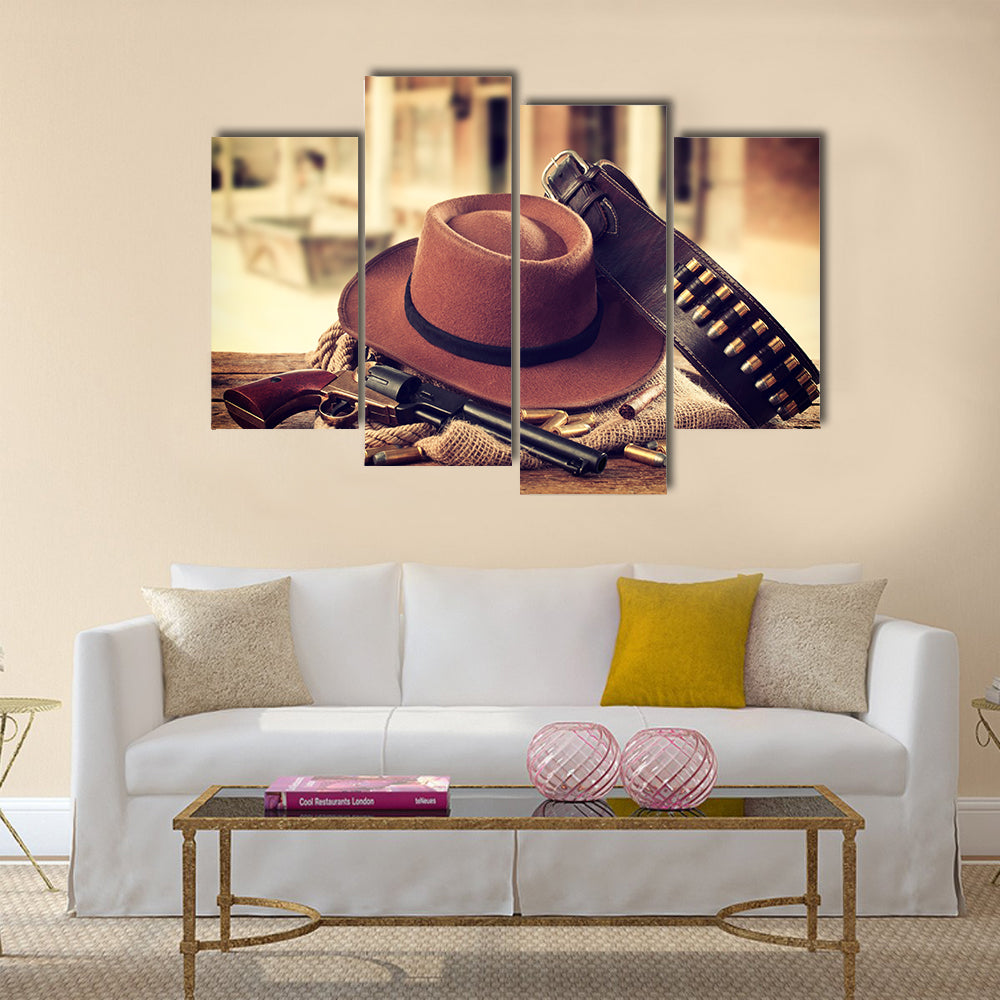 Western accessories on wooden table multi panel canvas wall art