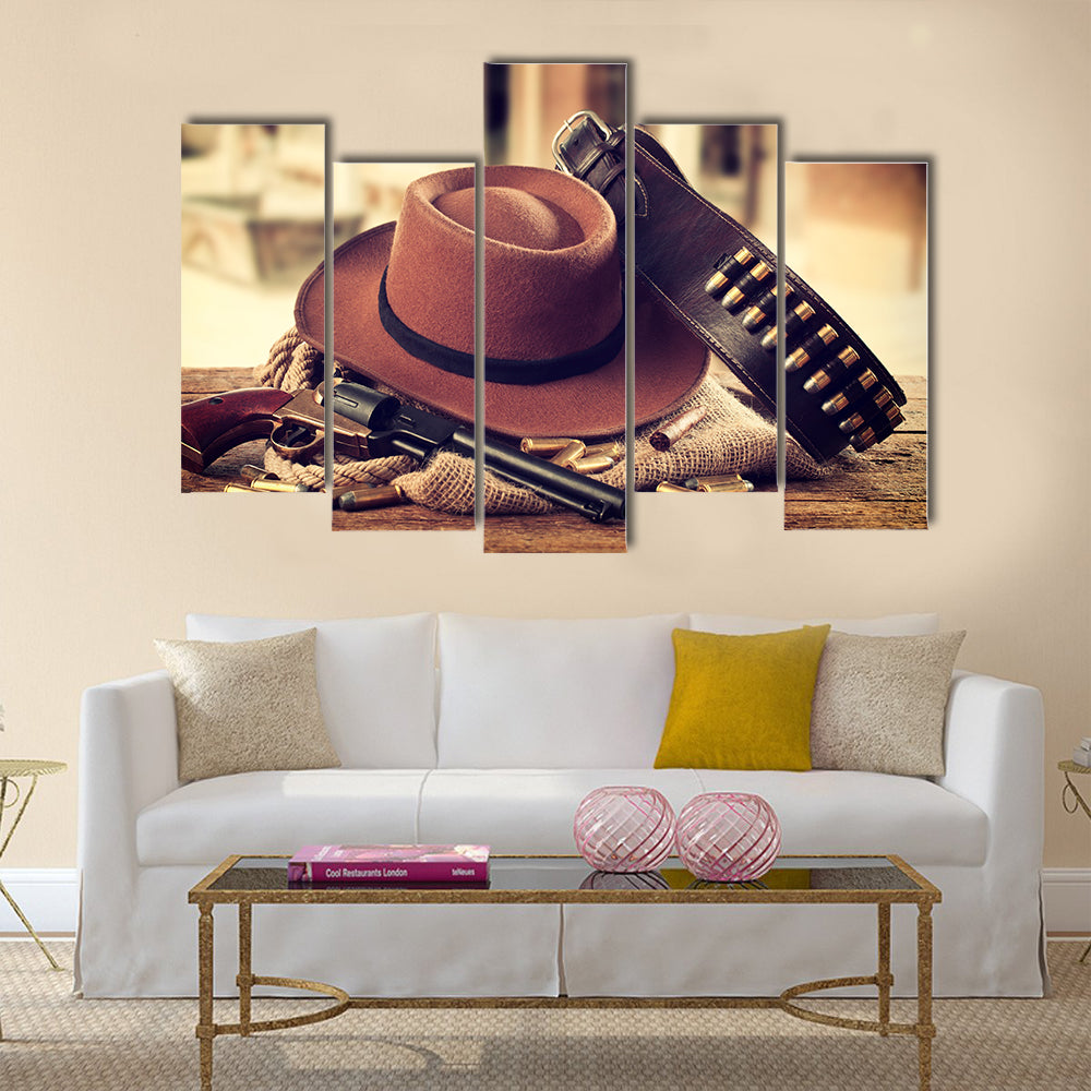 Western accessories on wooden table multi panel canvas wall art
