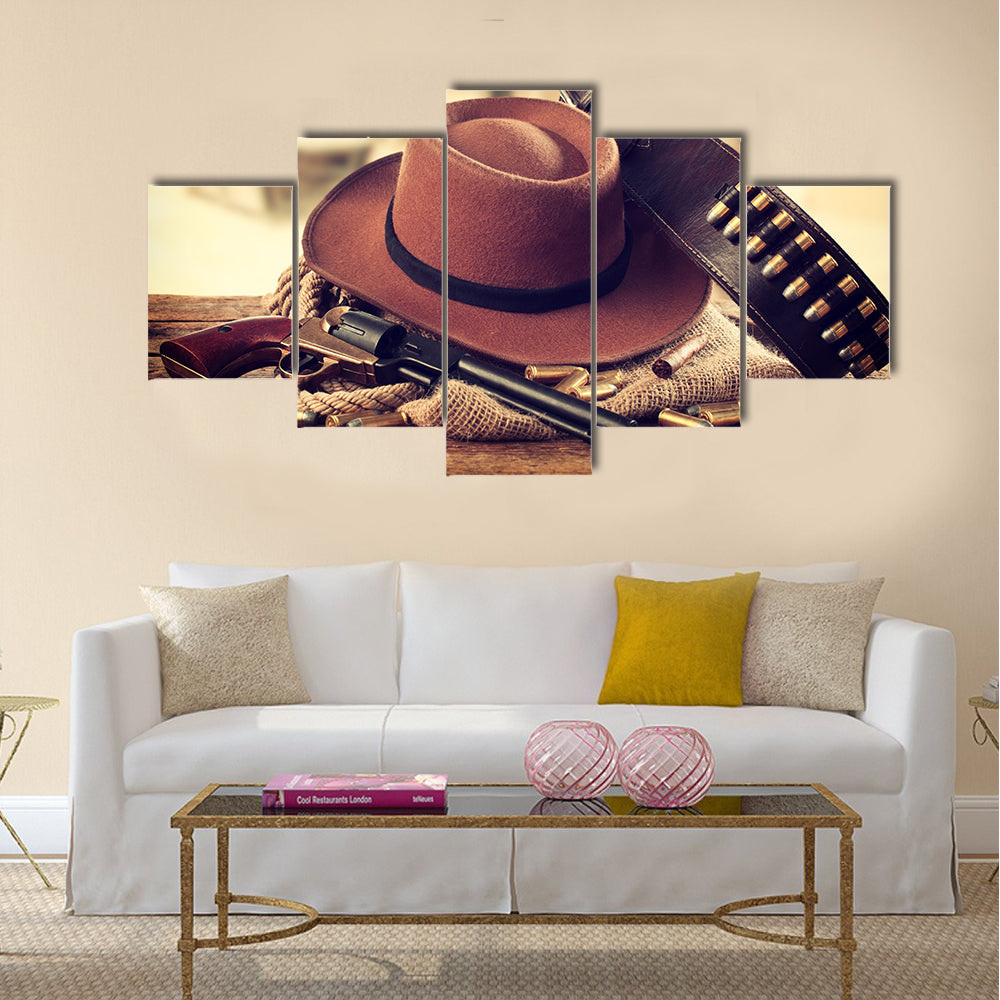 Western accessories on wooden table multi panel canvas wall art