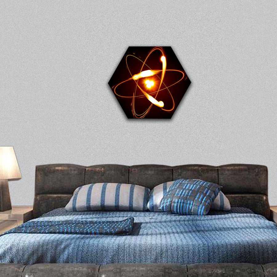 Symbol of atom over black background hexagonal canvas wall art