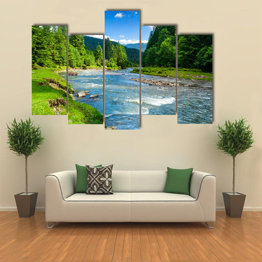 view of landscape with mountains trees and a river in front multi panel canvas wall art