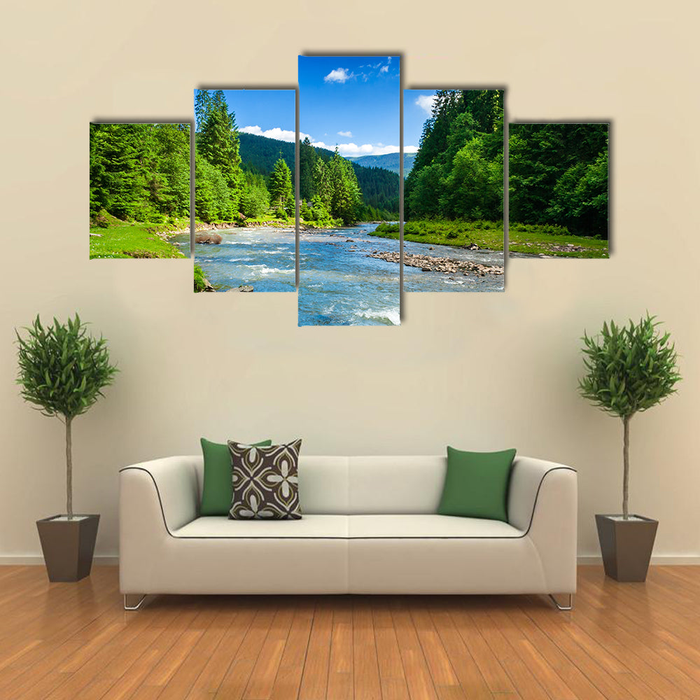 view of landscape with mountains trees and a river in front multi panel canvas wall art