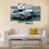 3d rendering of a brandless generic car of my own design in a tunnel with heavy motion blur Multi panel canvas wall art