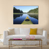 Kayak surfer on a lake Multi panel canvas wall art