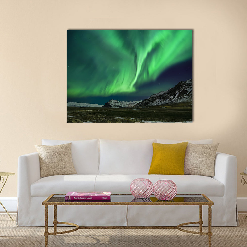 Flash of Aurora polaris above mountains Multi panel canvas wall art