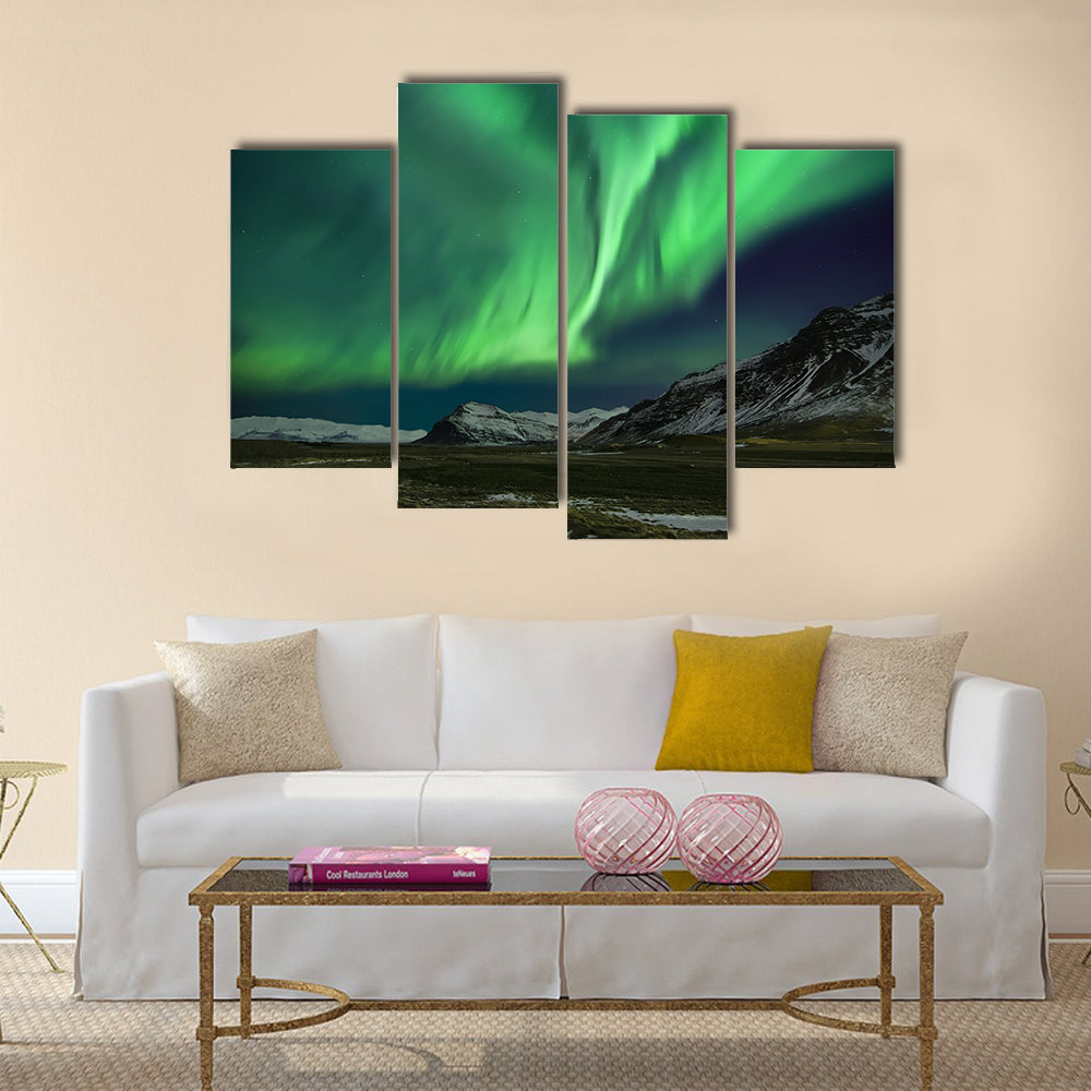 Flash of Aurora polaris above mountains Multi panel canvas wall art