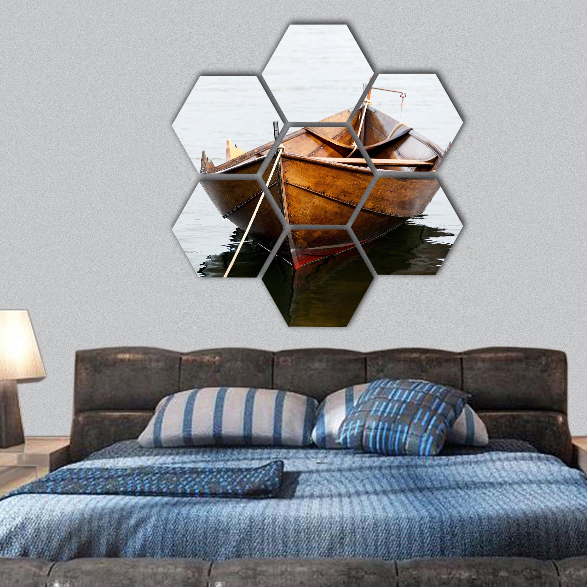 Old wooden row boat on water hexagonal canvas wall art