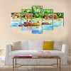 Landscape with boat on a river and village Multi panel canvas wall art