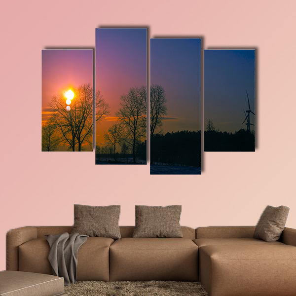 An image of sunset in winter scenery multi panel canvas wall art