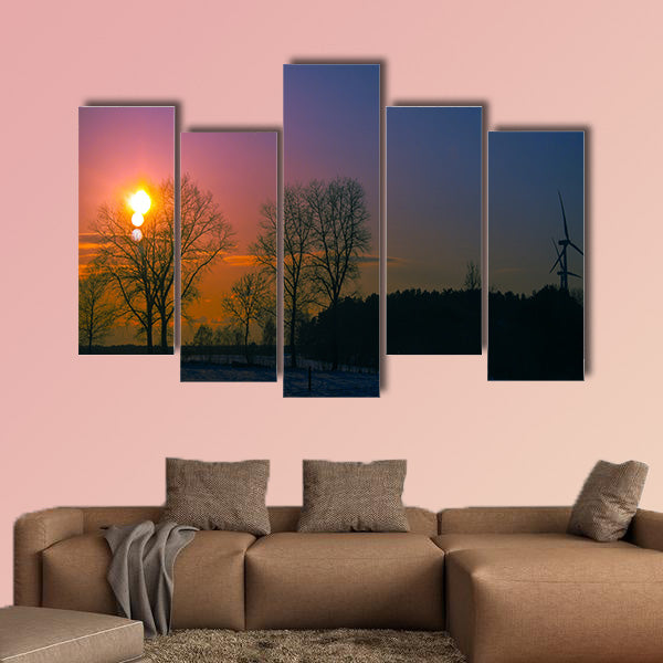 An image of sunset in winter scenery multi panel canvas wall art