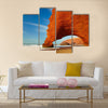 Red archs on atlantic ocean coast Multi Panel Canvas Wall Art