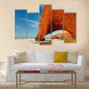 Red archs on atlantic ocean coast Multi Panel Canvas Wall Art