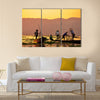 Fishermen is finish a day of fishing in Inle lake, Myanmar Burma Multi panel canvas wall art