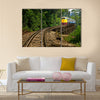 Rail travel in Kanchanaburi province is called Multi panel canvas wall art