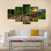 Rail travel in Kanchanaburi province is called Multi panel canvas wall art