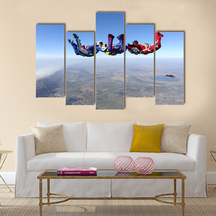 group of paratroopers ring in free fall Multi panel canvas wall art