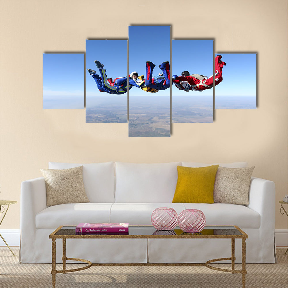 group of paratroopers ring in free fall Multi panel canvas wall art