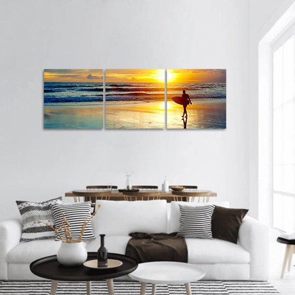 Surfer on the ocean beach at sunset on Bali island, Indonesia panoramic canvas wall art