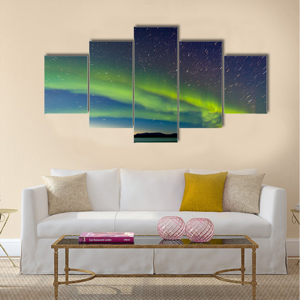 Intense Northern Lights or Aurora borealis or polar lights night sky multi panel canvas wall art