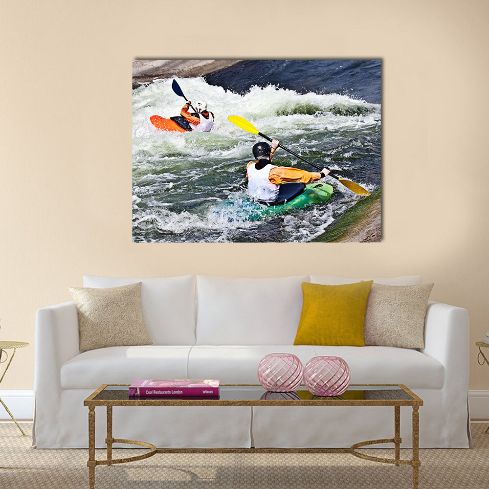 two active kayakers are rolling and surfing in rough water Multi panel canvas wall art