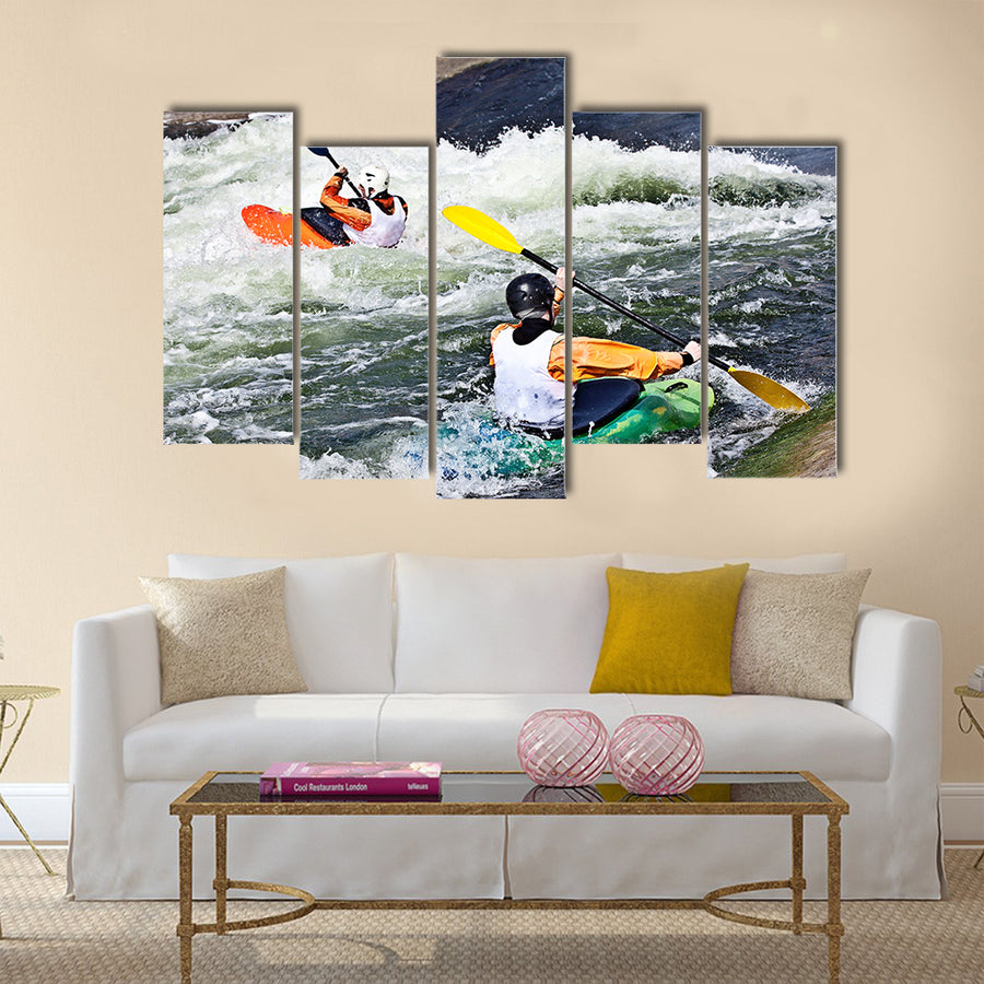 two active kayakers are rolling and surfing in rough water Multi panel canvas wall art