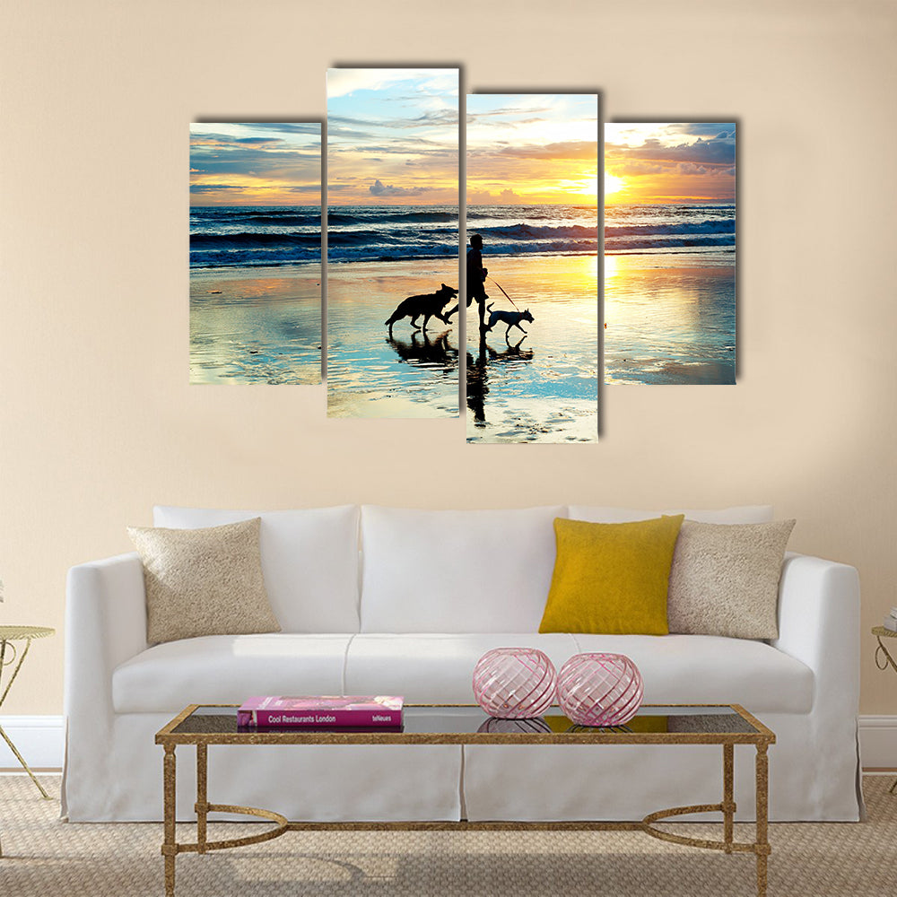 A Man With Dogs Running On Bali Island On Sunset, Indonesia Multi Panel Canvas Wall Art