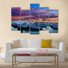 Blue fishing boats on an ocean coast in Essaouira, Morocco Multi panel canvas wall art