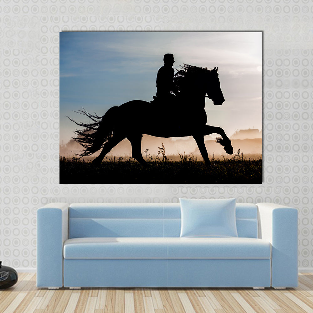 Silhouette of rider and horse in sunset background Multi panel canvas wall art