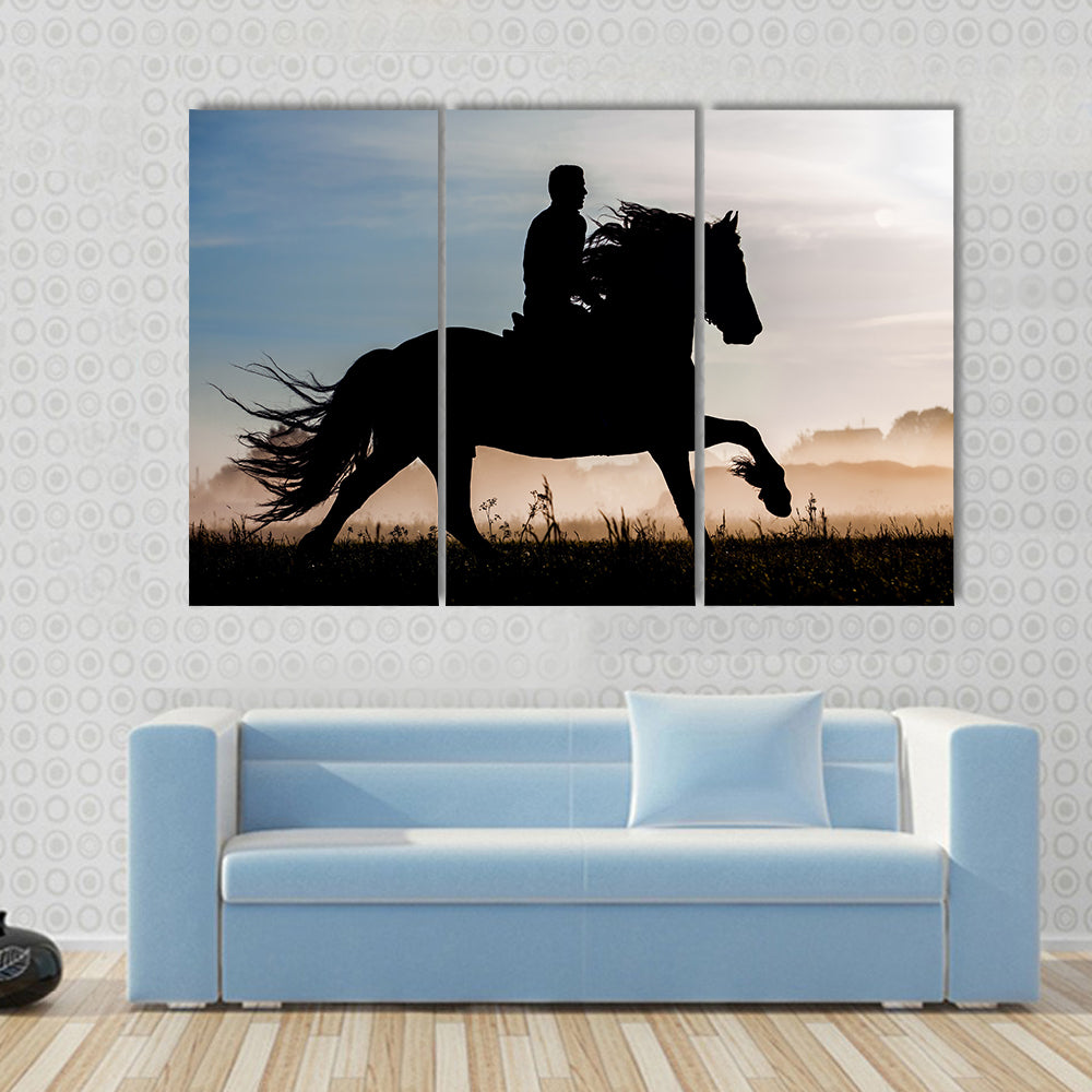 Silhouette of rider and horse in sunset background Multi panel canvas wall art