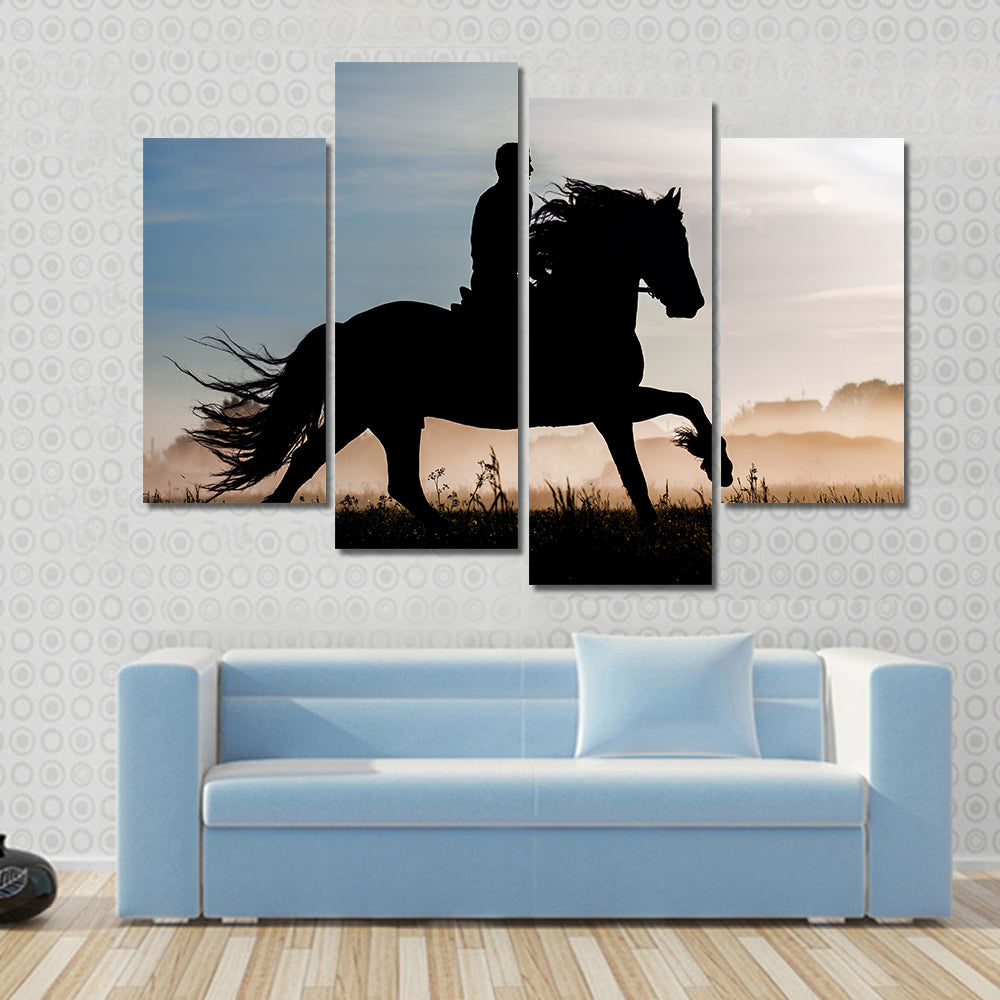 Silhouette of rider and horse in sunset background Multi panel canvas wall art