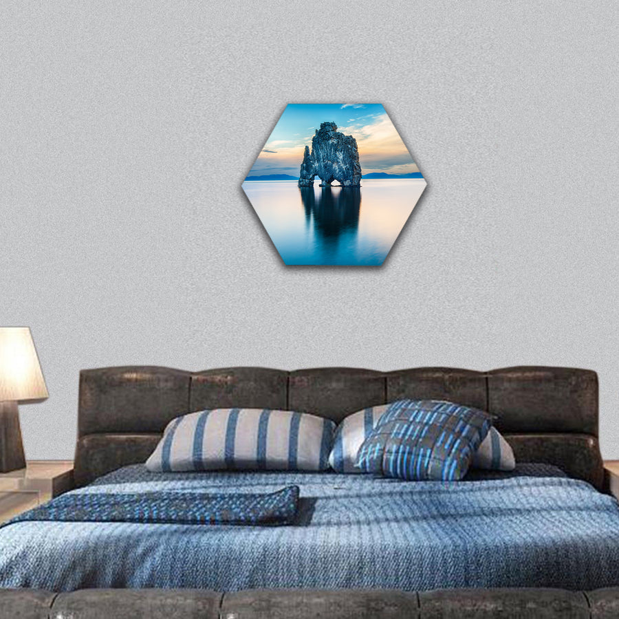 Hvitserkur reflects in the sea water after midnight sunset hexagonal canvas wall art