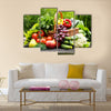 Fresh organic vegetables in wicker basket in the garden Multi panel canvas wall art