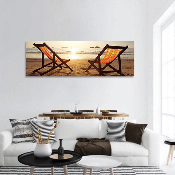 Beach, two deck chairs and blue sky panoramic canvas wall art