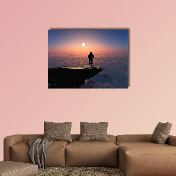Silhouette of a man on a rock Multi panel canvas wall art