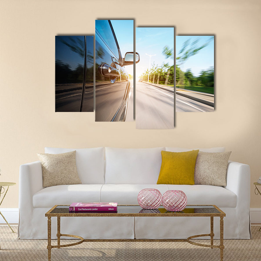 car on the road with motion blur background Multi panel canvas wall art