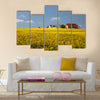 yellow rape field and farmhouses Multi Panel Canvas Wall Art