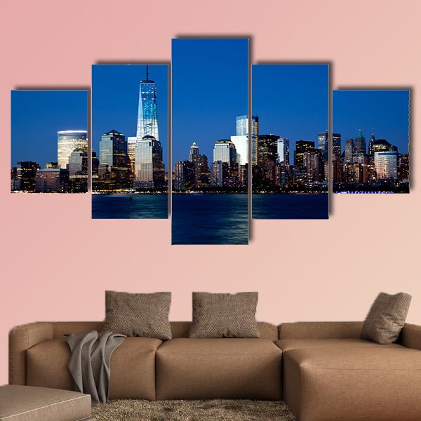 The new Freedom Tower and Lower Manhattan Skyline at Night Multi panel canvas wall art