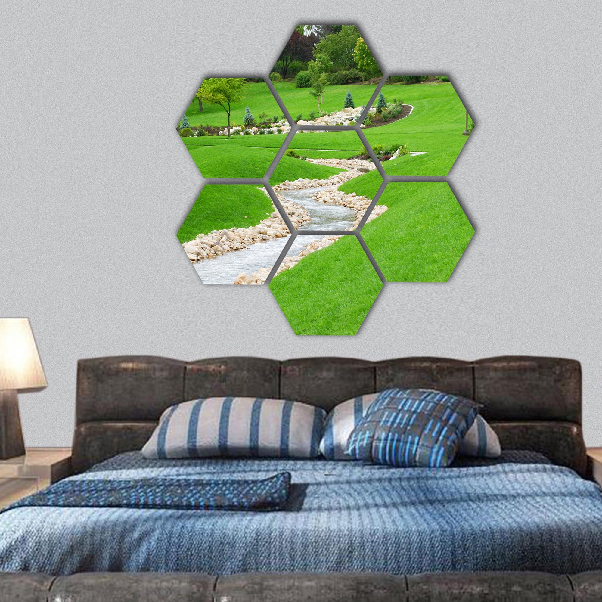 Stream of water flowing through grassy hills hexagonal canvas wall art