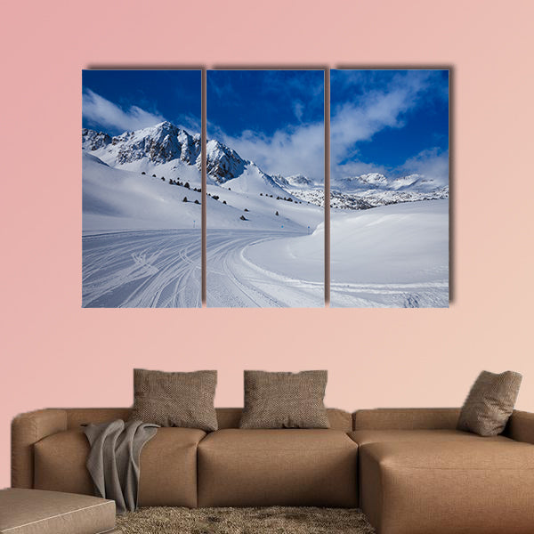 Fresh ski slope and mountains in sunny day Multi panel canvas wall art