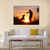 Creative man with his yellow labrador retriever in nature - back lit Multi panel canvas wall art