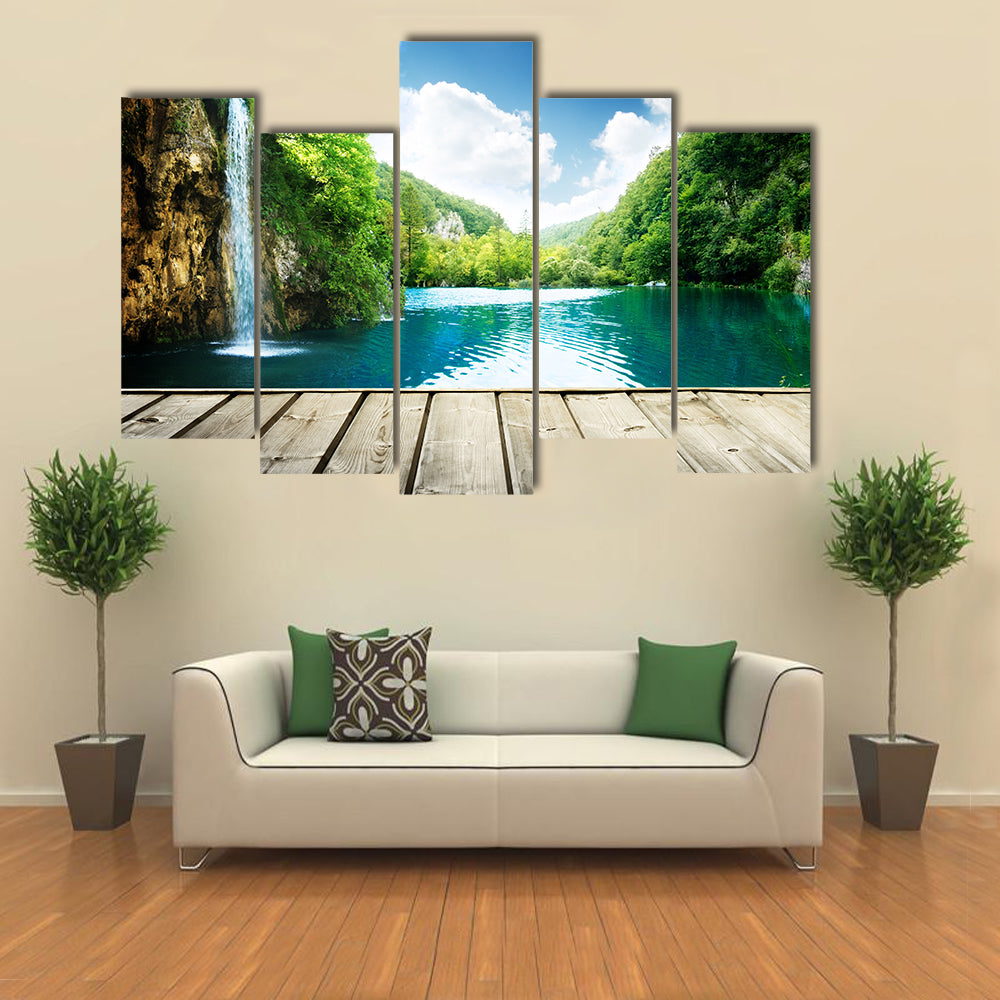 waterfall in deep forest of croatia and wood pier multi panel canvas wall art