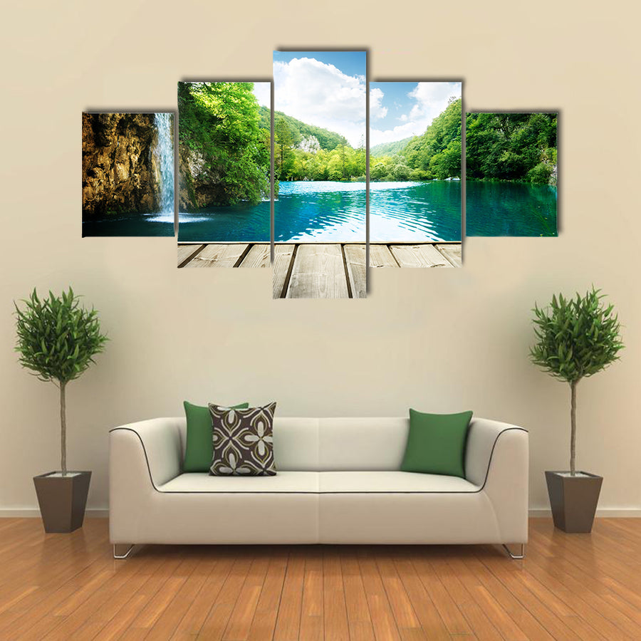waterfall in deep forest of croatia and wood pier multi panel canvas wall art