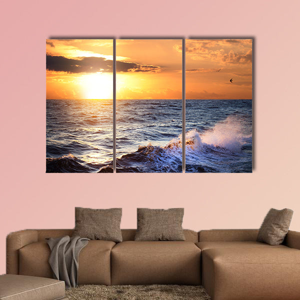 Stormy sea with sundown, clouds and birds multi panel canvas wall art