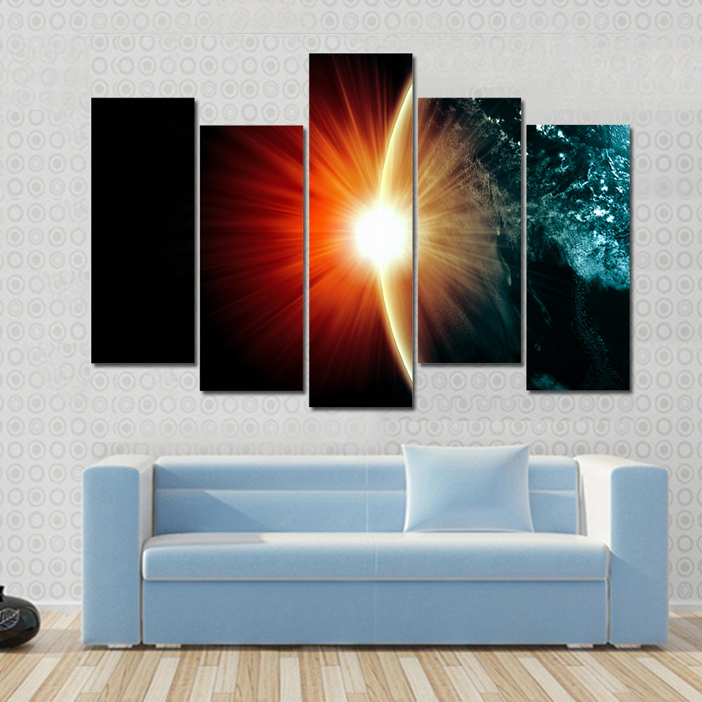 Planet Earth with appearing sunbeam light Multi Panel Canvas Wall Art